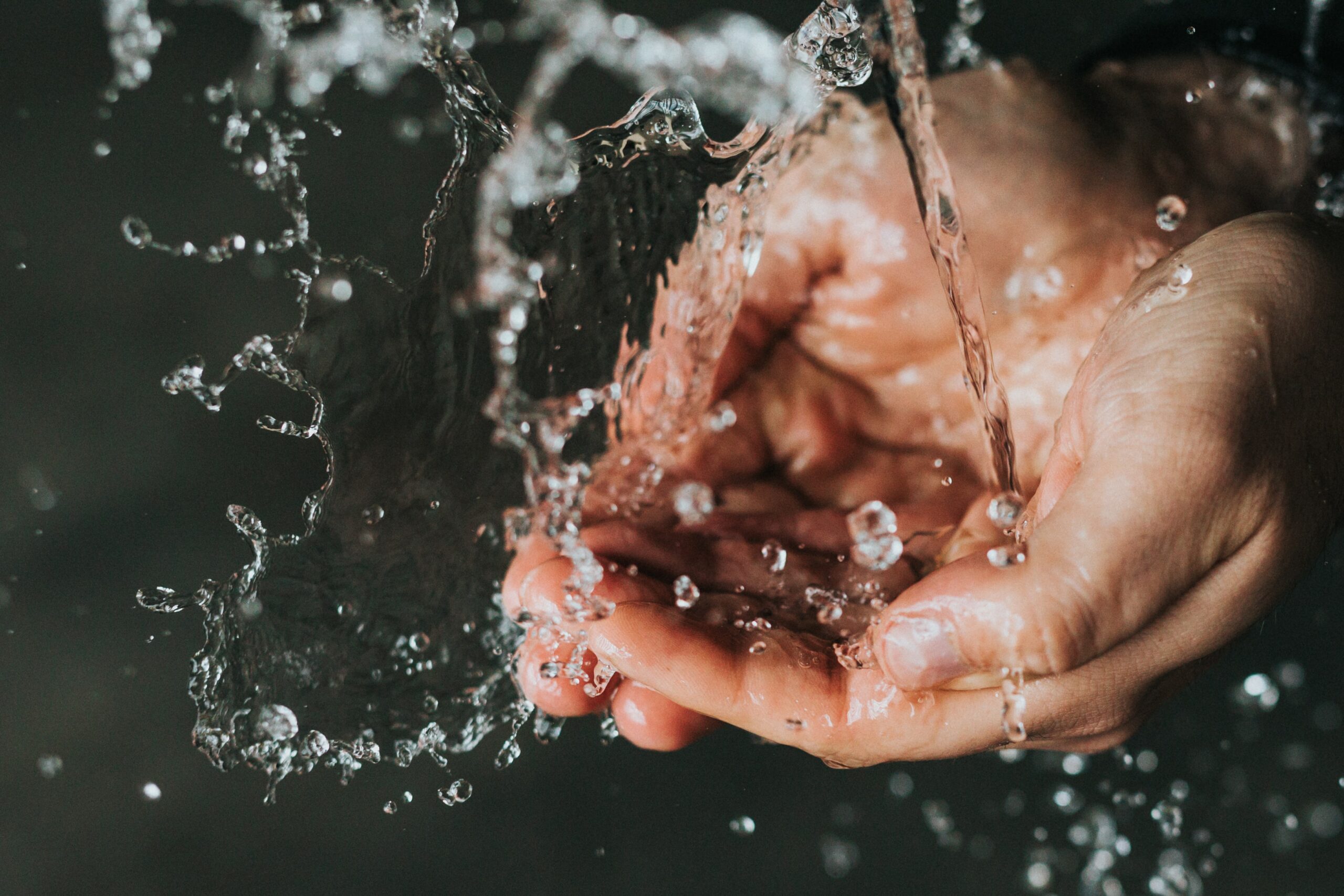 Water running over a pair of clean hands